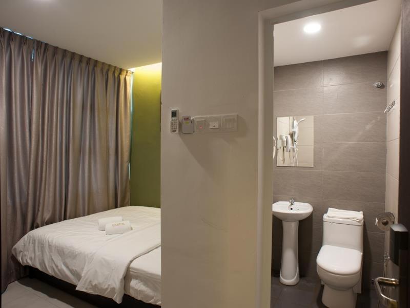 Econtel Queensbay Sungai Dua Bukit Экстерьер фото